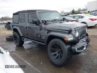 2021 Jeep Wrangler Unlimited Sahara High Altitude with VIN 1C4HJXENXMW503535, listed as a IAAI auction lot 41212320 with 70,375 mi miles and . Bid and sale history available at DreamBid. Image 1.