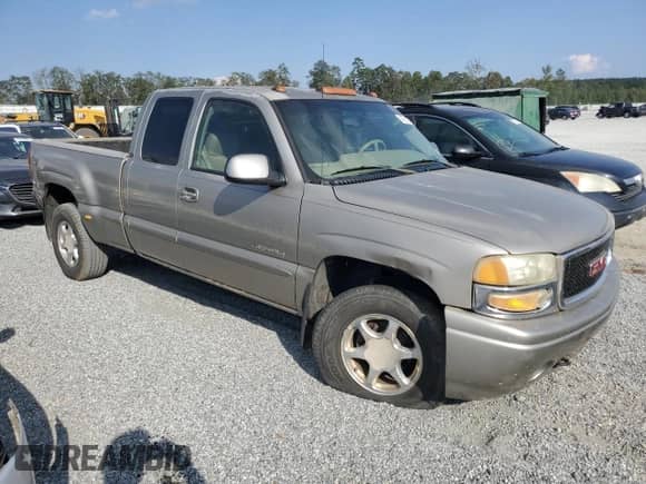 2002 GMC Sierra 1500 Denali z VIN 2GTFK69U421383350, wystawiony jako Copart lot #74765724 z przebiegiem Nie podano mil oraz Szkoda całkowita • Salvage title. Historia ofert i sprzedaży dostępna na DreamBid. Obrazek 4.