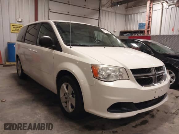 2013 Dodge Grand Caravan SE z VIN 2C4RDGBG4DR533818, wystawiony jako IAAI lot #41981195 z przebiegiem 166 658 mil mil oraz . Historia ofert i sprzedaży dostępna na DreamBid. Obrazek 1.