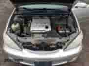 2005 Toyota Camry LE z VIN 4T1BF32K95U084032, wystawiony jako Copart lot #82052665 z przebiegiem 261 218 mil mil oraz Szkoda całkowita • Salvage title. Historia ofert i sprzedaży dostępna na DreamBid. Obrazek 11.