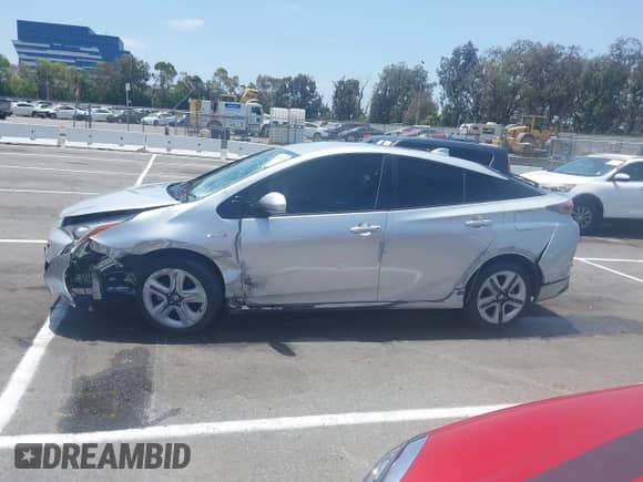 2017 Toyota Prius Two z VIN JTDKARFU0H3042988, wystawiony jako IAAI lot #42580166 z przebiegiem 169 300 mil mil oraz . Historia ofert i sprzedaży dostępna na DreamBid. Obrazek 14.