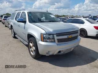 2013 Chevrolet Suburban LTZ with VIN 1GNSCKE04DR151162, listed as a IAAI auction lot 43409568 with 224,131 mi miles and . Bid and sale history available at DreamBid. Image 1.