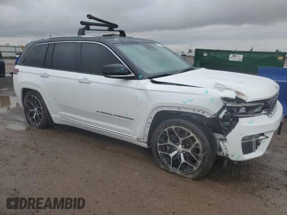 2023 Jeep Grand Cherokee Summit with VIN 1C4RJHEG9P8762635, listed as a Copart auction lot 55822285 with 39,495 mi miles and Salvage title. Bid and sale history available at DreamBid. Image 4.