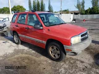 2003 Chevrolet Tracker z VIN 2CNBE13CX36943395, wystawiony jako Copart lot #70964574 z przebiegiem 118 975 mil mil oraz Szkoda całkowita • Salvage title. Historia ofert i sprzedaży dostępna na DreamBid. Obrazek 4.