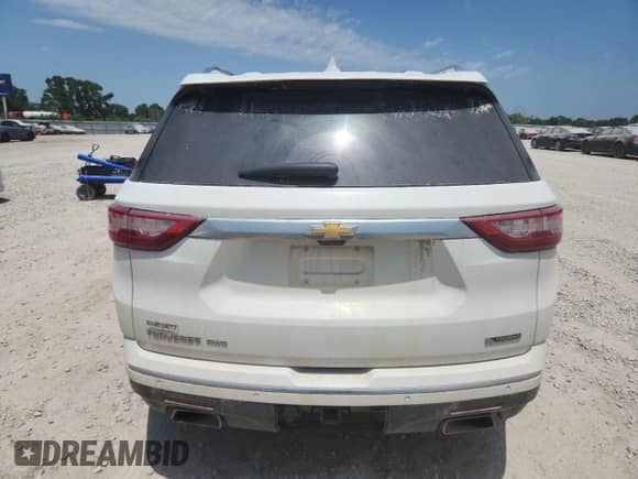 2018 Chevrolet Traverse Premier with VIN 1GNEVJKW4JJ270057, listed as a Copart auction lot 64105845 with 146,063 mi miles and Salvage title. Bid and sale history available at DreamBid. Image 6.