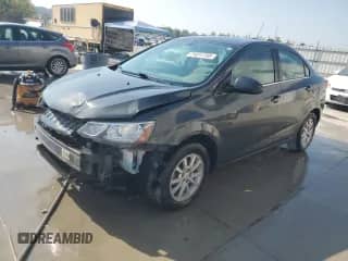 2018 Chevrolet Sonic LT with VIN 1G1JD5SH1J4139159, listed as a Copart auction lot 71011795 with 203,394 mi miles and Salvage title. Bid and sale history available at DreamBid. Image 1.