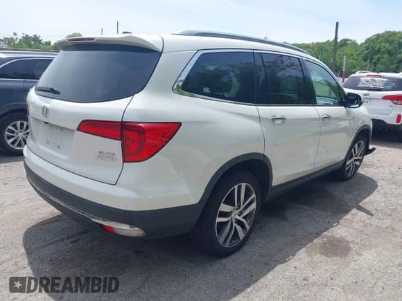 2018 Honda Pilot Elite с VIN 5FNYF6H03JB047552, выставлен на аукционе IAAI как лот 42364392 с пробегом 92 768 миль миль и . История ставок и продаж доступна на DreamBid. Изображение 4.