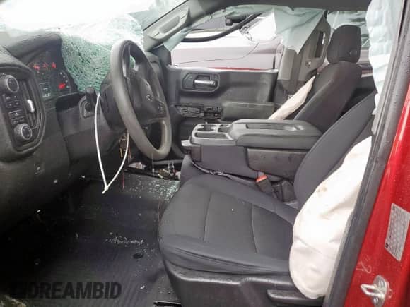 2019 Chevrolet Silverado 1500 Custom Trail Boss with VIN 1GCRYCEF7KZ210138, listed as a Copart auction lot 60256585 with 117,668 mi miles and Salvage title. Bid and sale history available at DreamBid. Image 7.