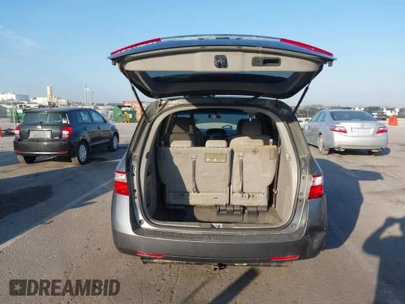 2011 Honda Odyssey EX с VIN 5FNRL5H47BB060140, выставлен на аукционе IAAI как лот 43464919 с пробегом 186 117 миль миль и . История ставок и продаж доступна на DreamBid. Изображение 17.