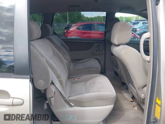 2005 Toyota Sienna CE with VIN 5TDZA23C65S239594, listed as a IAAI auction lot 42352060 with 157,684 mi miles and . Bid and sale history available at DreamBid. Image 8.