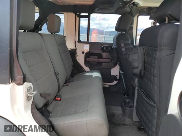 2008 Jeep Wrangler Unlimited Rubicon z VIN 1J8GA69178L531306, wystawiony jako Copart lot #84476765 z przebiegiem 111 979 mil mil oraz Szkoda całkowita • Salvage title. Historia ofert i sprzedaży dostępna na DreamBid. Obrazek 10.