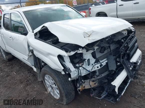 2024 Toyota Tacoma SR5 with VIN 3TMLB5JN5RM010502, listed as a IAAI auction lot 43521054 with 22,894 mi miles and . Bid and sale history available at DreamBid. Image 6.