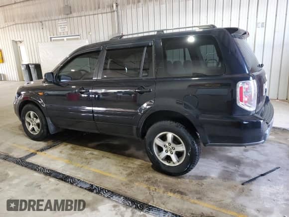 2006 Honda Pilot EX z VIN 5FNYF28456B001501, wystawiony jako Copart lot #65802075 z przebiegiem 290 084 mil mil oraz Szkoda całkowita • Salvage title. Historia ofert i sprzedaży dostępna na DreamBid. Obrazek 2.