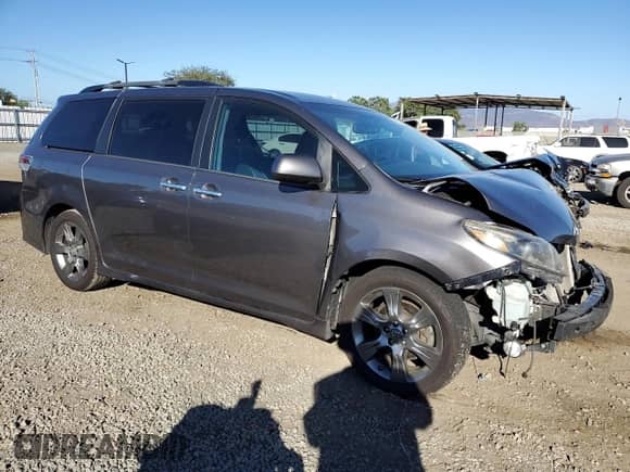 2016 Toyota Sienna SE with VIN 5TDXK3DC5GS722747, listed as a Copart auction lot 84521305 with 216,919 mi miles and Salvage title. Bid and sale history available at DreamBid. Image 4.