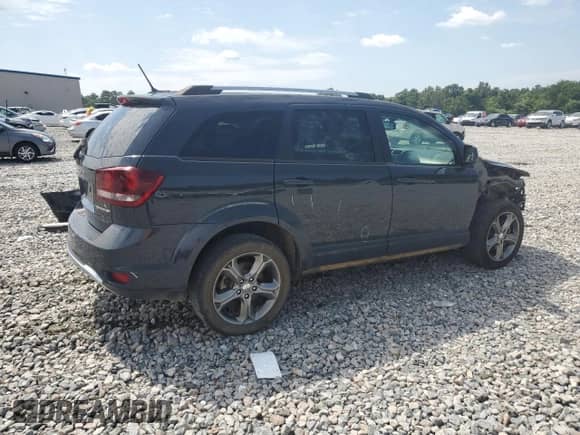 2017 Dodge Journey Crossroad Plus with VIN 3C4PDCGBXHT582442, listed as a Copart auction lot 62005185 with 143,477 mi miles and Salvage title. Bid and sale history available at DreamBid. Image 3.