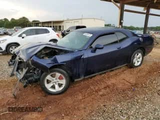 2013 Dodge Challenger SXT z VIN 2C3CDYAG7DH676527, wystawiony jako Copart lot #66930415 z przebiegiem 170 584 mil mil oraz Szkoda całkowita • Salvage title. Historia ofert i sprzedaży dostępna na DreamBid. Obrazek 1.