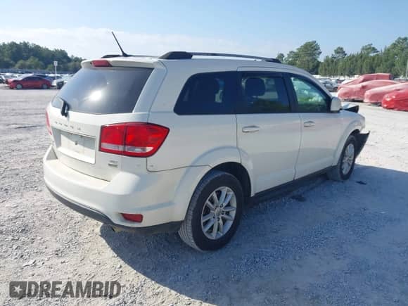 2017 Dodge Journey SXT z VIN 3C4PDCBG8HT589795, wystawiony jako IAAI lot #43359975 z przebiegiem 129 361 mil mil oraz . Historia ofert i sprzedaży dostępna na DreamBid. Obrazek 4.