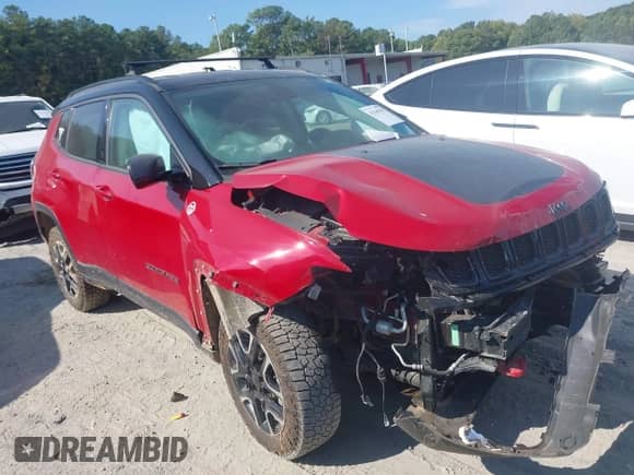 2020 Jeep Compass Trailhawk z VIN 3C4NJDDB8LT143999, wystawiony jako IAAI lot #43169195 z przebiegiem 68 923 mil mil oraz . Historia ofert i sprzedaży dostępna na DreamBid. Obrazek 1.