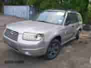 2007 Subaru Forester X with VIN JF1SG63687G744508, listed as a IAAI auction lot 42435402 with 177,248 mi miles and . Bid and sale history available at DreamBid. Image 2.