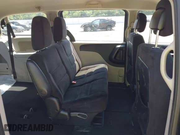 2014 Dodge Grand Caravan SE with VIN 2C4RDGBG7ER248080, listed as a IAAI auction lot 42683662 with 128,616 mi miles and . Bid and sale history available at DreamBid. Image 8.