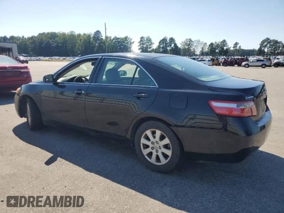 2007 Toyota Camry CE z VIN 4T1BE46K77U044845, wystawiony jako Copart lot #80031745 z przebiegiem 184 820 mil mil oraz Szkoda całkowita • Salvage title. Historia ofert i sprzedaży dostępna na DreamBid. Obrazek 2.