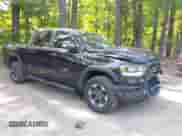 2019 Ram 1500 Rebel z VIN 1C6SRFLT5KN652309, wystawiony jako IAAI lot #42406112 z przebiegiem 130 590 mil mil oraz . Historia ofert i sprzedaży dostępna na DreamBid. Obrazek 1.