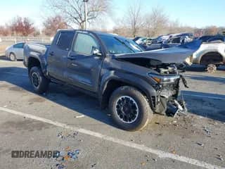 2024 Toyota Tacoma SR5 with VIN 3TMLB5JN3RM028853, listed as a IAAI auction lot 40990601 with 10,095 mi miles and . Bid and sale history available at DreamBid. Image 1.