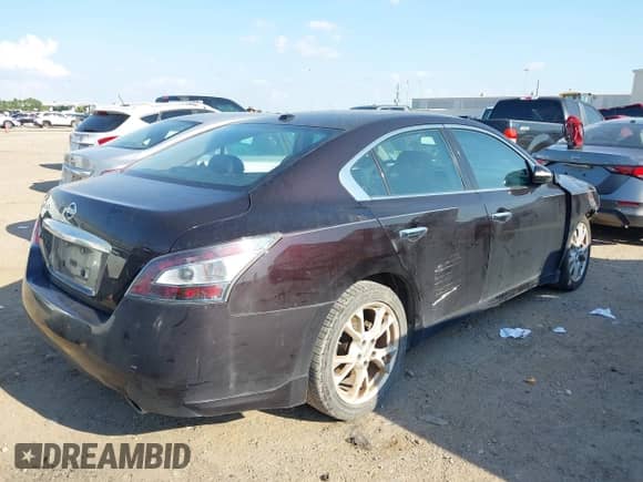 2012 Nissan Maxima SV z VIN 1N4AA5AP0CC869796, wystawiony jako IAAI lot #43137261 z przebiegiem 135 291 mil mil oraz . Historia ofert i sprzedaży dostępna na DreamBid. Obrazek 4.