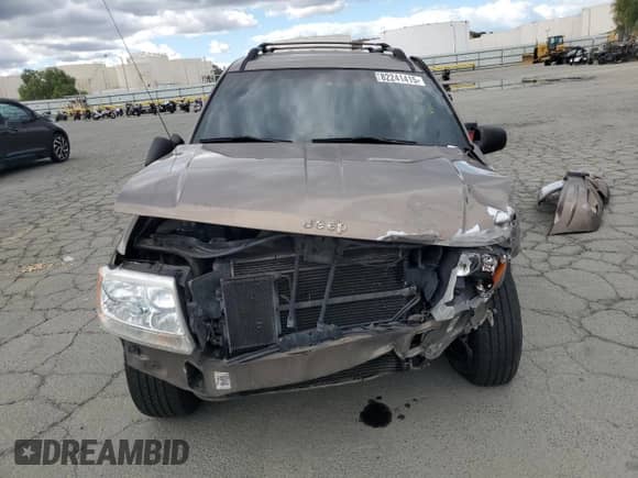 2001 Jeep Grand Cherokee Limited с VIN 1J4GW58N01C543370, выставлен на аукционе Copart как лот 82241415 с пробегом 186 565 миль миль и Списание • Salvage title. История ставок и продаж доступна на DreamBid. Изображение 5.