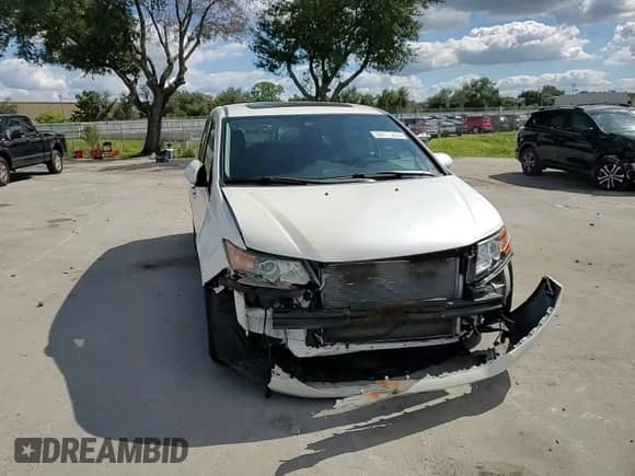 2016 Honda Odyssey Touring Elite z VIN 5FNRL5H90GB072441, wystawiony jako Copart lot #86773865 z przebiegiem 179 735 mil mil oraz Szkoda całkowita • Salvage title. Historia ofert i sprzedaży dostępna na DreamBid. Obrazek 14.