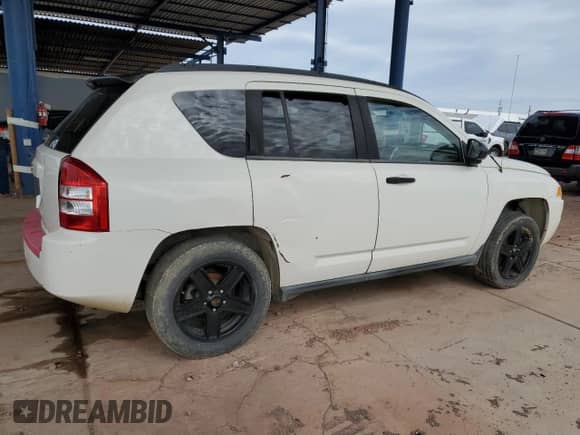 2007 Jeep Compass Sport with VIN 1J8FT47W37D145824, listed as a Copart auction lot 70866745 with 193,992 mi miles and Clean title. Bid and sale history available at DreamBid. Image 3.