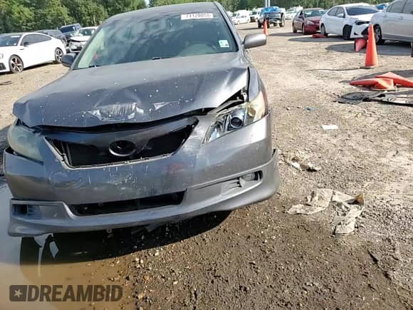 2007 Toyota Camry LE с VIN 4T1BK46K47U041233, выставлен на аукционе Copart как лот 71120055 с пробегом Не указан миль и Списание • Salvage title. История ставок и продаж доступна на DreamBid. Изображение 13.