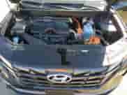 2024 Hyundai Tucson SEL with VIN KM8JBDD25RU215764, listed as a Copart auction lot 61615885 with 7,103 mi miles and Salvage title. Bid and sale history available at DreamBid. Image 12.