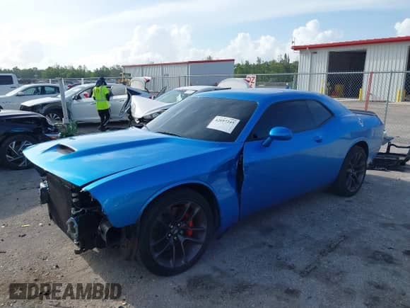 2023 Dodge Challenger GT with VIN 2C3CDZJG5PH577747, listed as a IAAI auction lot 42697245 with 24,226 mi miles and . Bid and sale history available at DreamBid. Image 2.