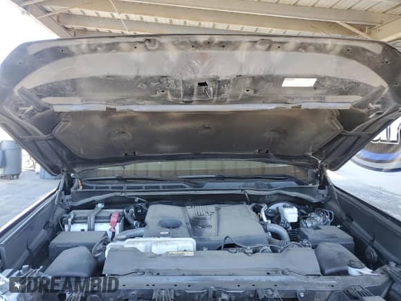 2023 Toyota Tundra SR5 with VIN 5TFLA5DA7PX129459, listed as a Copart auction lot 67829615 with 59,761 mi miles and Salvage title. Bid and sale history available at DreamBid. Image 11.