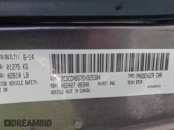 2014 Dodge Charger SE with VIN 2C3CDXBG7EH325384, listed as a IAAI auction lot 43031175 with 203,375 mi miles and . Bid and sale history available at DreamBid. Image 9.