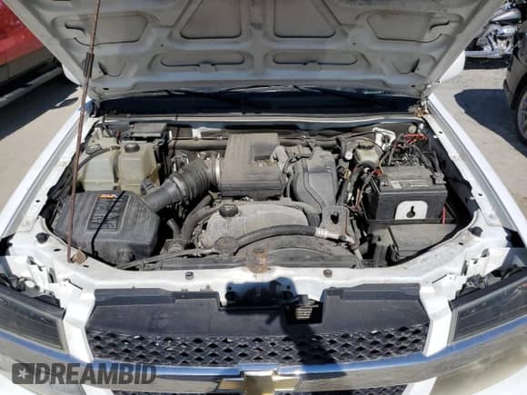 2012 Chevrolet Colorado Work Truck z VIN 1GCESBFE9C8164724, wystawiony jako Copart lot #76771844 z przebiegiem Nie podano mil oraz Czysty tytuł • Clean title. Historia ofert i sprzedaży dostępna na DreamBid. Obrazek 11.