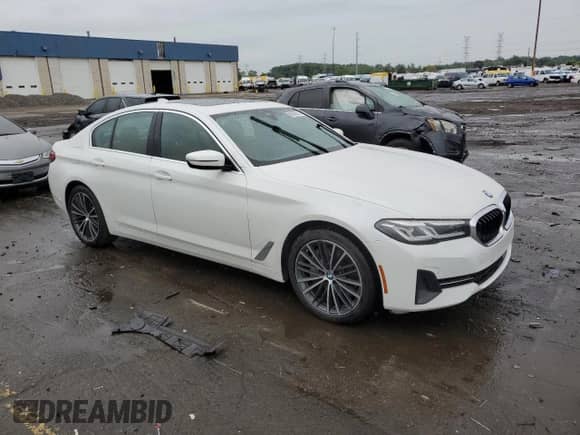 2023 BMW 5 Series 540i xDrive with VIN WBA73BJ0XPWY22700, listed as a Copart auction lot 69348915 with 39,019 mi miles and Salvage title. Bid and sale history available at DreamBid. Image 4.