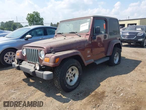 2004 Jeep Wrangler Sahara с VIN 1J4FA59S24P738401, выставлен на аукционе IAAI как лот 42934340 с пробегом 130 924 миль миль и . История ставок и продаж доступна на DreamBid. Изображение 2.