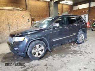2012 Jeep Grand Cherokee Limited z VIN 1C4RJFBT4CC264632, wystawiony jako Copart lot #90137105 z przebiegiem 214 018 mil mil oraz Czysty tytuł • Clean title. Historia ofert i sprzedaży dostępna na DreamBid. Obrazek 1.