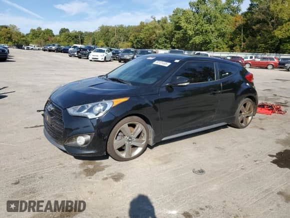 2013 Hyundai Veloster Turbo с VIN KMHTC6AE0DU148225, выставлен на аукционе Copart как лот 80101495 с пробегом 140 047 миль миль и Чистый • Clean title. История ставок и продаж доступна на DreamBid. Изображение 1.