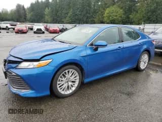 2019 Toyota Camry Hybrid LE с VIN 4T1B21HK9KU010337, выставлен на аукционе Copart как лот 84294555 с пробегом 35 132 миль миль и Списание • Salvage title. История ставок и продаж доступна на DreamBid. Изображение 1.