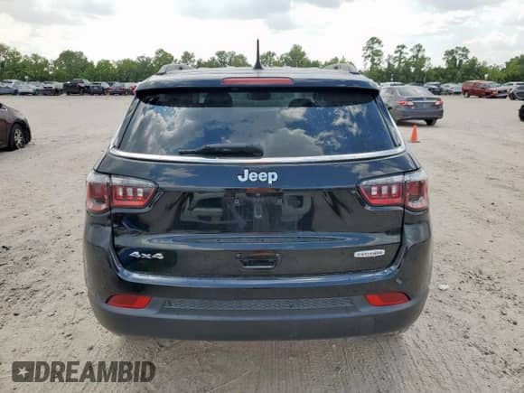 2021 Jeep Compass Latitude with VIN 3C4NJDBBXMT584022, listed as a Copart auction lot 69013615 with 74,898 mi miles and Salvage title. Bid and sale history available at DreamBid. Image 6.