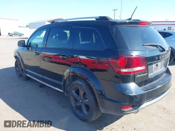 2019 Dodge Journey Crossroad with VIN 3C4PDCGG7KT815518, listed as a IAAI auction lot 43224536 with 97,784 mi miles and . Bid and sale history available at DreamBid. Image 3.