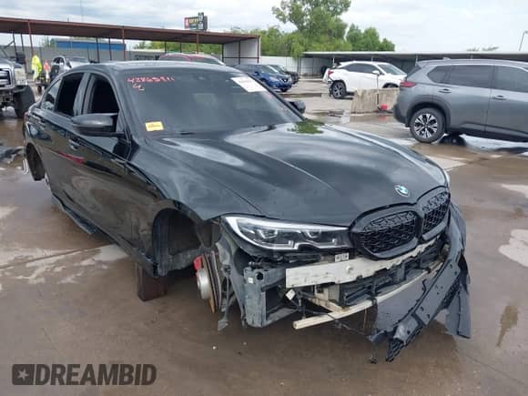 2020 BMW 3 Series 330i with VIN 3MW5R1J01L8B23880, listed as a IAAI auction lot 42865811 with Not provided miles and . Bid and sale history available at DreamBid. Image 1.