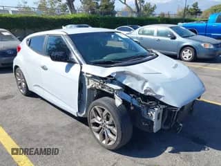 2015 Hyundai Veloster with VIN KMHTC6AD9FU220484, listed as a IAAI auction lot 43293982 with 154,614 mi miles and . Bid and sale history available at DreamBid. Image 1.