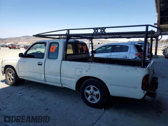 1995 Toyota Tacoma z VIN 4TAUN53B5SZ002480, wystawiony jako Copart lot #71305825 z przebiegiem 467 592 mil mil oraz Szkoda całkowita • Salvage title. Historia ofert i sprzedaży dostępna na DreamBid. Obrazek 2.