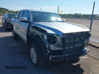 2024 Toyota Tacoma TRD Off Road with VIN 3TMLB5JN8RM010395, listed as a IAAI auction lot 43375716 with 20,319 mi miles and . Bid and sale history available at DreamBid. Image 1.