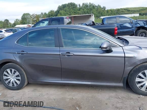 2021 Toyota Camry Hybrid LE with VIN 4T1H31AK0MU553127, listed as a IAAI auction lot 43099811 with 27,442 mi miles and . Bid and sale history available at DreamBid. Image 13.