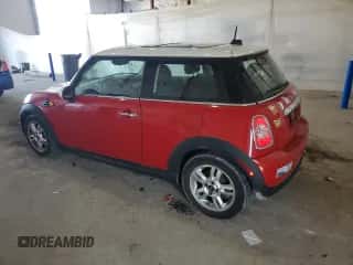 2013 MINI Hardtop with VIN WMWSU3C59DT687082, listed as a Copart auction lot 61967995 with 107,708 mi miles and Clean title. Bid and sale history available at DreamBid. Image 2.